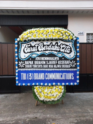 Papan Bunga Duka di Mata